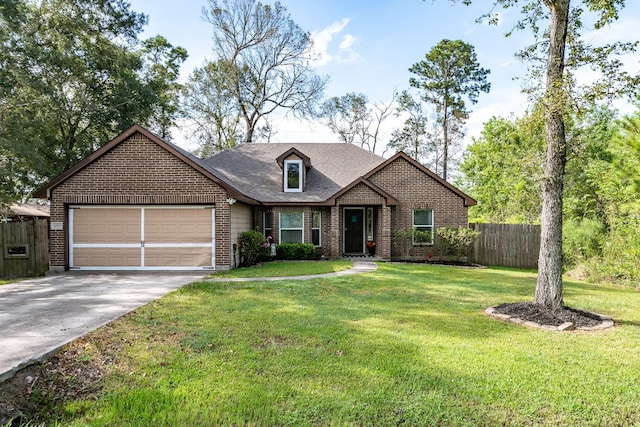 view of front facade featuring a garage and a front yard