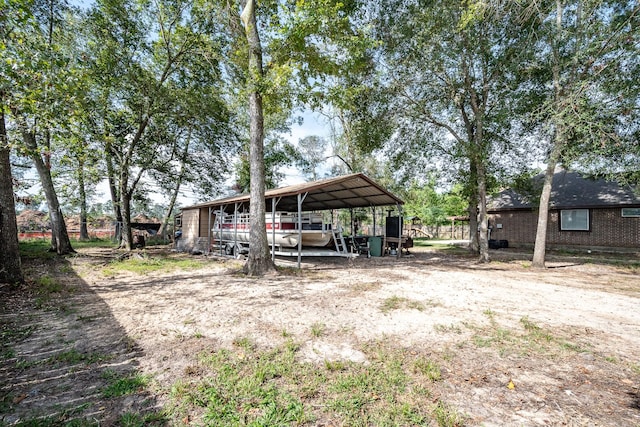 view of yard with a carport