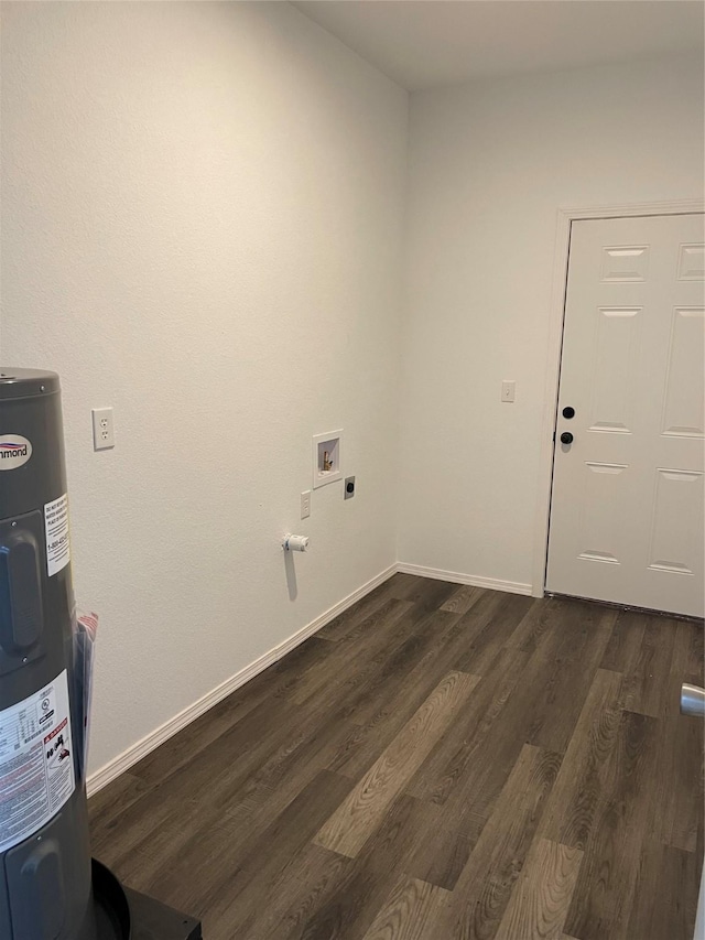 washroom featuring electric dryer hookup, hookup for a washing machine, electric water heater, and dark hardwood / wood-style flooring