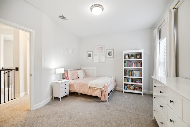 bedroom with dark carpet