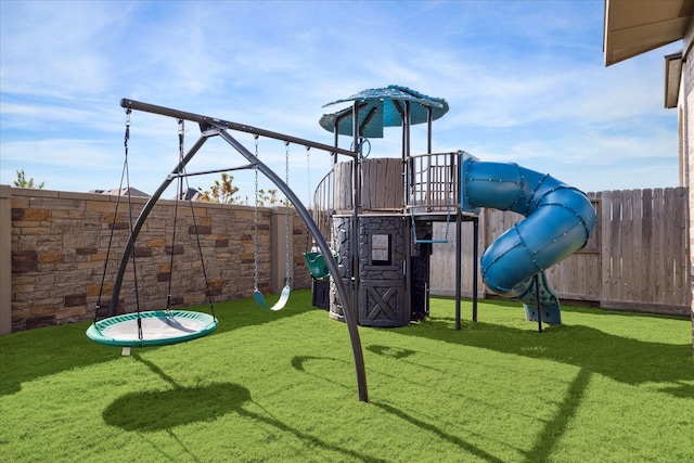 view of jungle gym with a yard