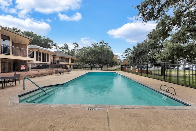 view of pool with a patio area