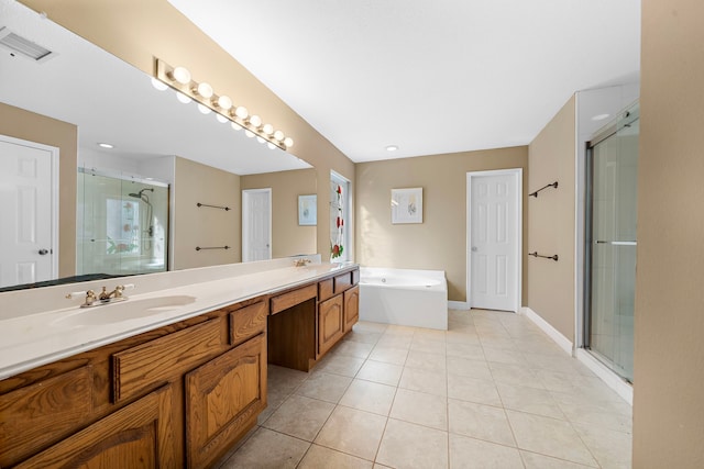 bathroom with vanity, tile patterned floors, and independent shower and bath