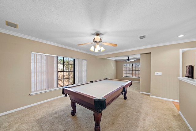 recreation room with plenty of natural light, crown molding, and billiards