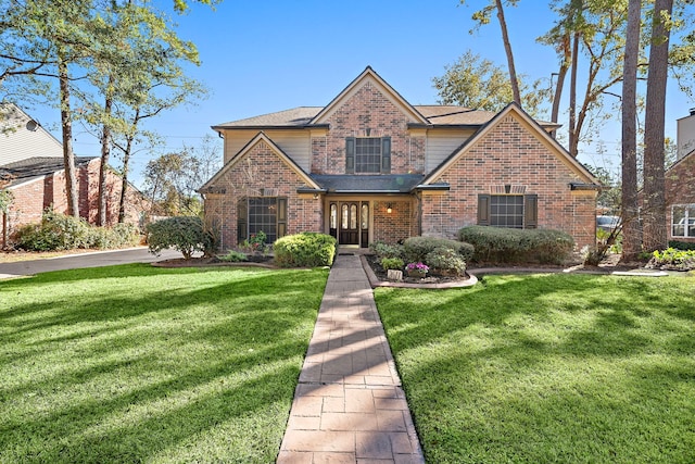 view of front of home featuring a front yard