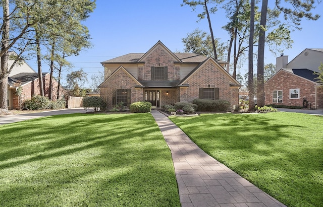 view of front of home featuring a front yard