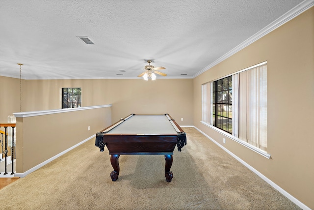 game room featuring billiards, carpet flooring, ceiling fan, ornamental molding, and a textured ceiling