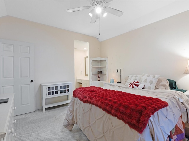 carpeted bedroom featuring ceiling fan and lofted ceiling