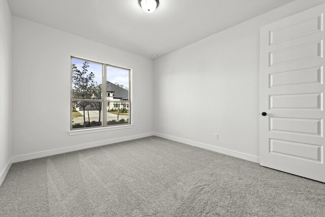 empty room with carpet floors