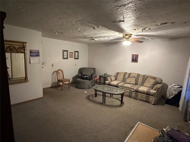 living room featuring carpet, a textured ceiling, and ceiling fan