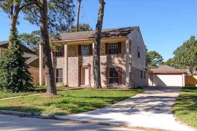 view of front facade featuring a garage and a front lawn