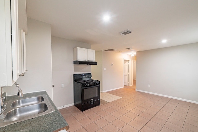 kitchen with black range with gas stovetop, white cabinetry, sink, and light tile patterned floors