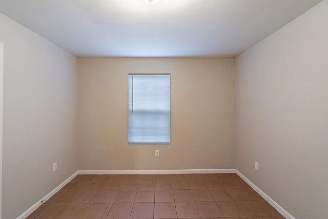 view of tiled spare room