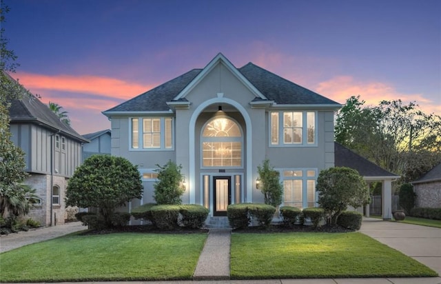 view of front of house with a lawn