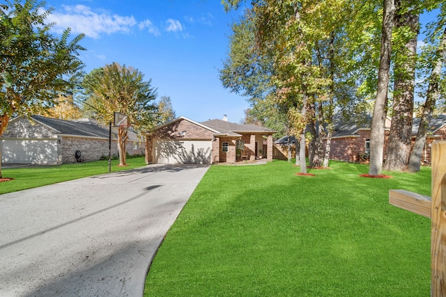 single story home with a front yard and a garage