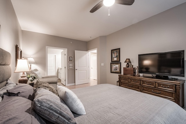 bedroom featuring connected bathroom and ceiling fan