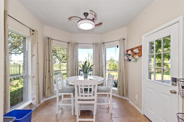 dining room featuring a wealth of natural light and ceiling fan