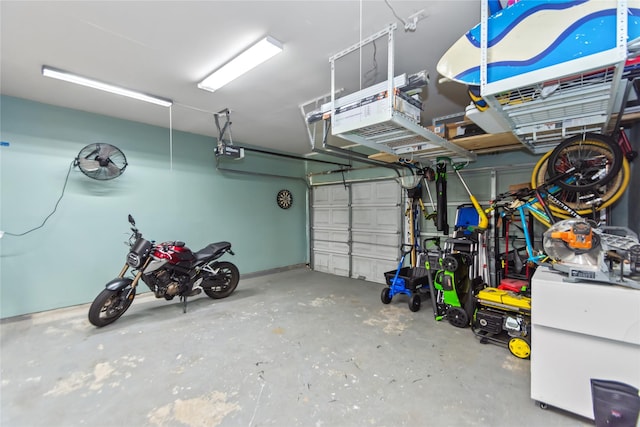 garage featuring a garage door opener