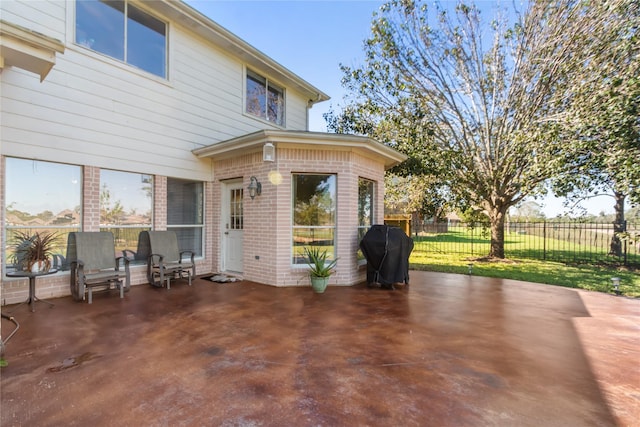 view of patio with a grill