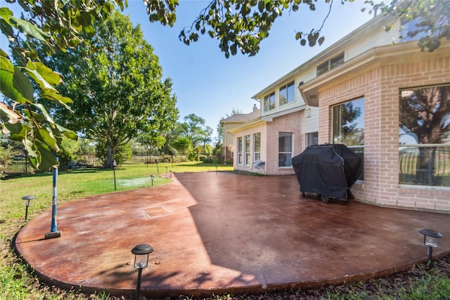 view of patio with a grill