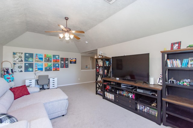 living room with carpet, ceiling fan, and vaulted ceiling