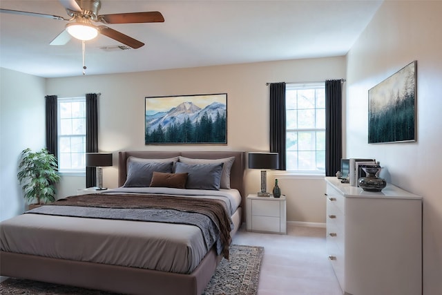 112 Kirkwood Ln, Conroe, TX 77304 - bedroom featuring light carpet and ceiling fan