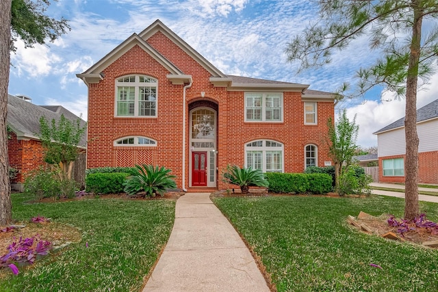 view of front of home with a front lawn