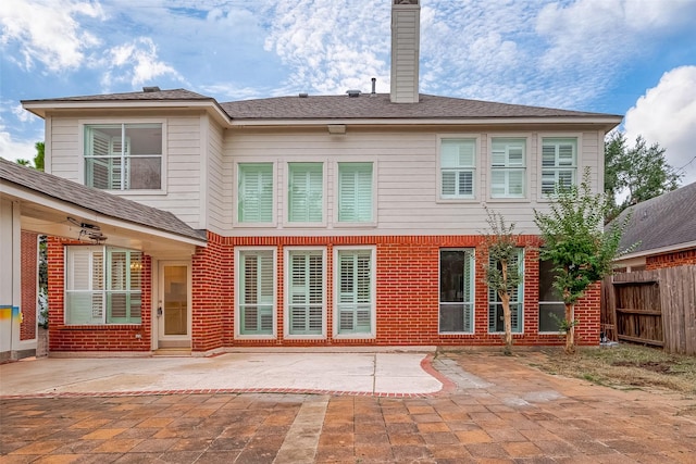 rear view of house with a patio area