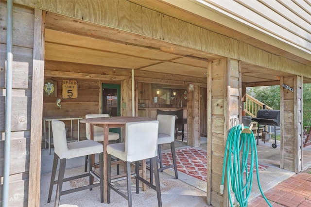 view of patio featuring a grill