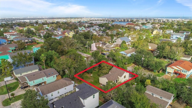 626 Clear Lake Rd, Clear Lake Shores, TX 77565 - aerial view of residential area featuring property parcel outlined and a notable bridge