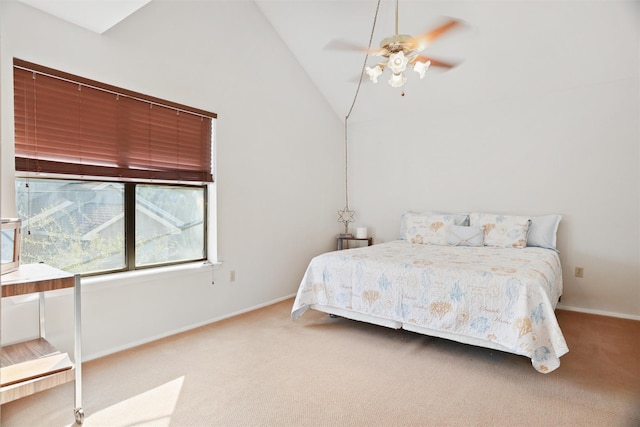 bedroom featuring carpet, high vaulted ceiling, and ceiling fan