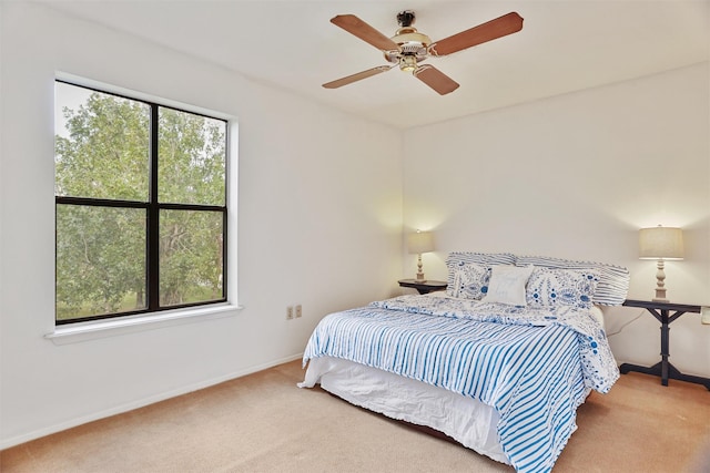 bedroom featuring carpet flooring and ceiling fan