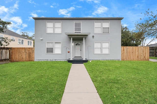 view of front property featuring a front yard