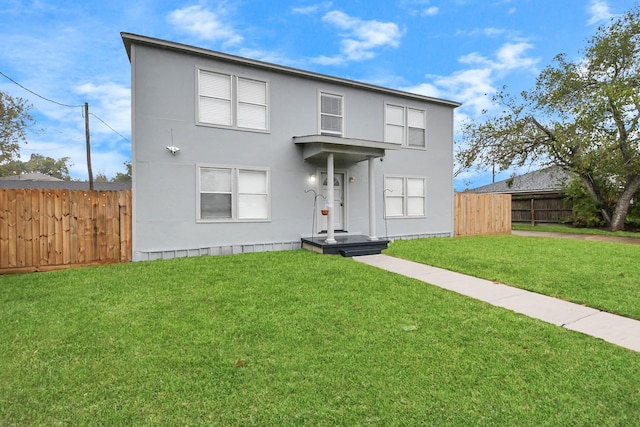 view of front of house featuring a front lawn