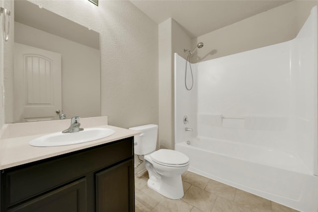 full bathroom featuring tile patterned flooring, vanity, bathtub / shower combination, and toilet