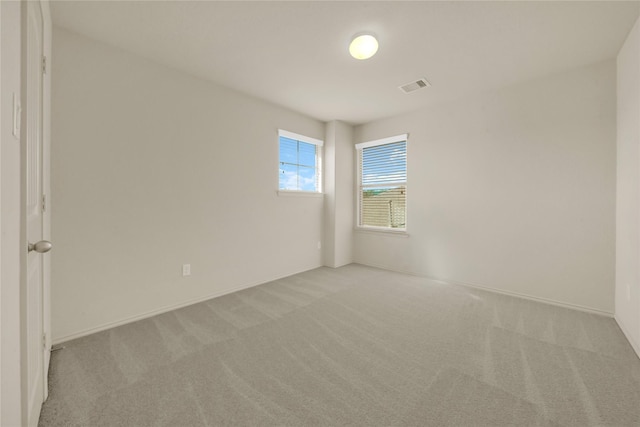 view of carpeted spare room