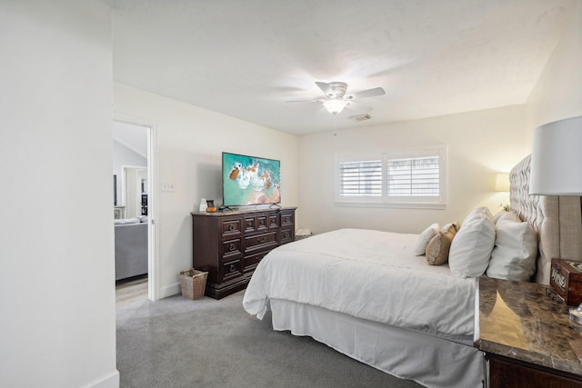 carpeted bedroom featuring ceiling fan