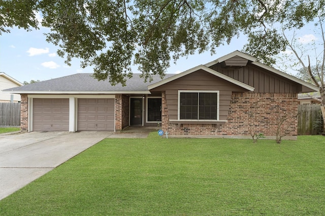 single story home with a front yard and a garage