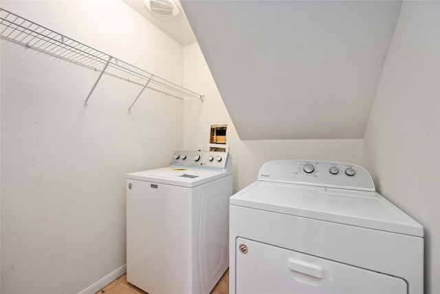 laundry area featuring separate washer and dryer