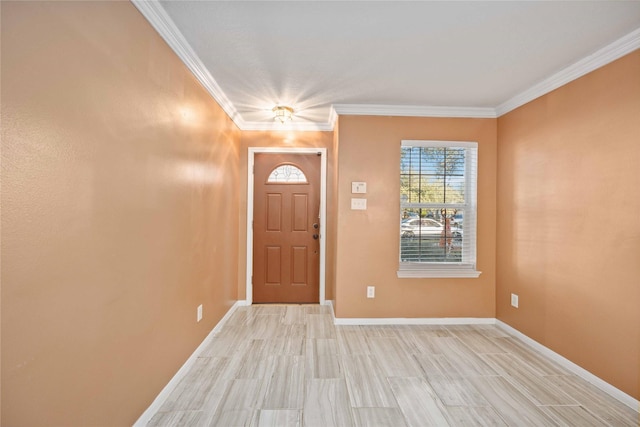 entryway with light wood-type flooring and crown molding