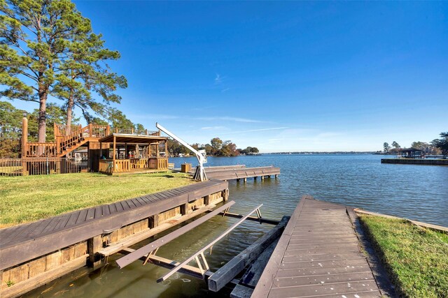 3315 Vineyard Ln, Montgomery, TX 77356 - view of dock featuring a yard, a water view, and stairway
