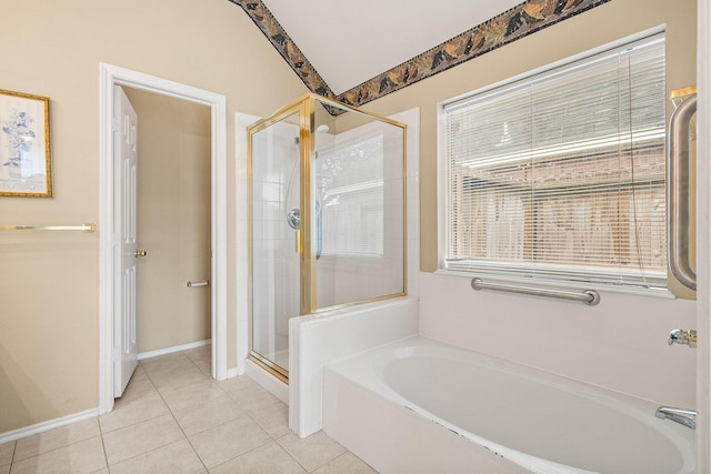 bathroom featuring separate shower and tub and tile patterned flooring