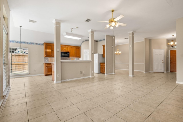 unfurnished living room featuring light tile patterned floors and ceiling fan with notable chandelier