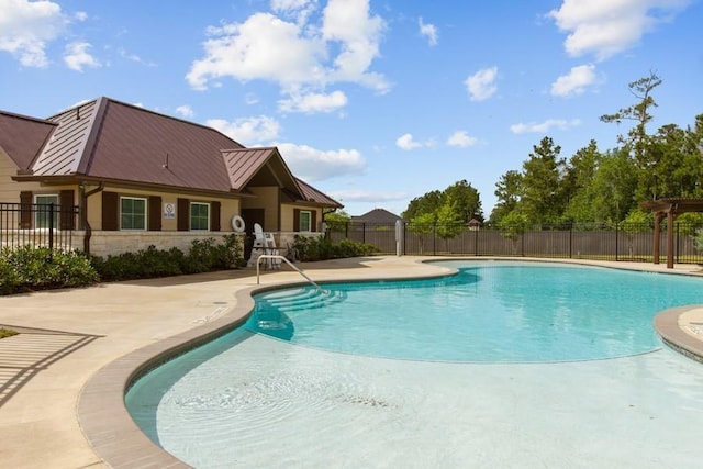 view of swimming pool featuring a patio