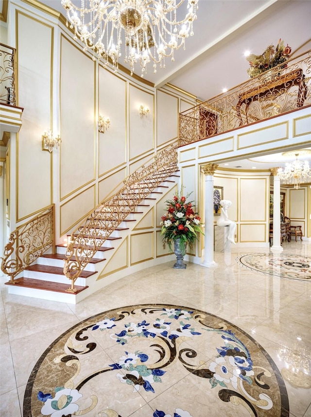 interior space with a towering ceiling and decorative columns