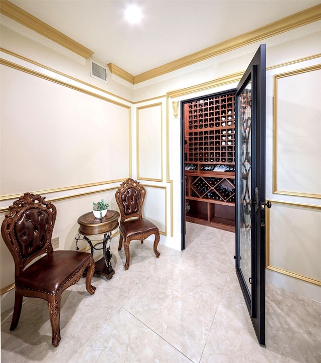 wine area with ornamental molding