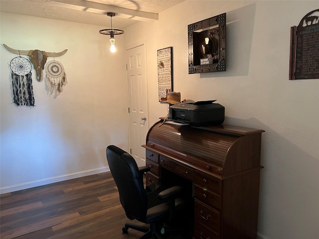 office area with a textured ceiling and dark wood-type flooring