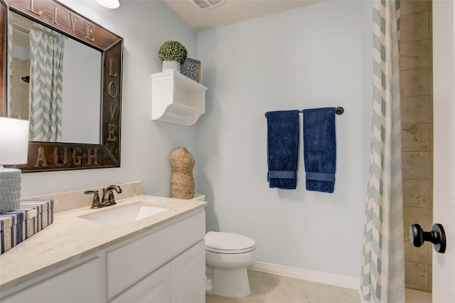 bathroom with tile patterned flooring, vanity, toilet, and a shower with curtain