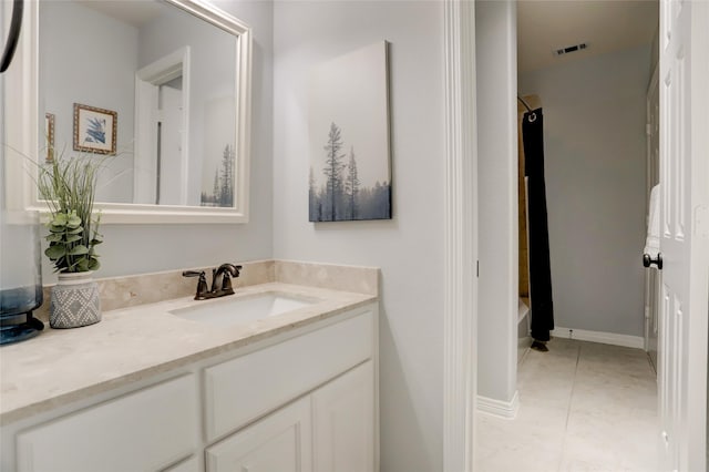 bathroom featuring shower / tub combination, tile patterned flooring, and vanity