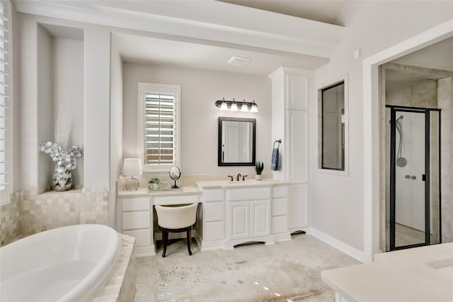 bathroom featuring vanity and shower with separate bathtub